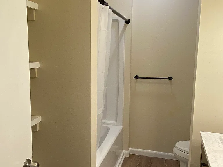 Master Bath with shower and ample shelving
