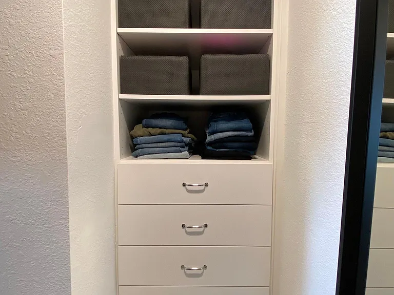 Additional clothing storage in master closet