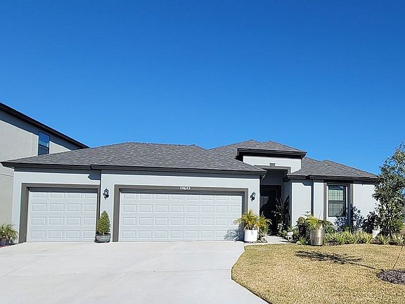 Juno 3-car exterior home plan tuscan elevation William Ryan Homes Tampa