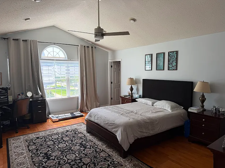 Master bedroom with two separate walk-in closets, huge room with high ceilings