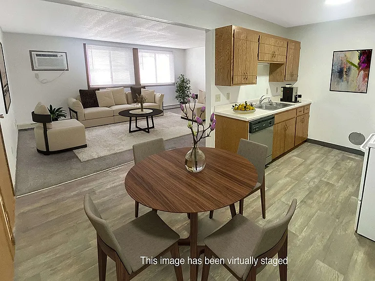 Kitchen and Dining Area with Wood Style Flooring