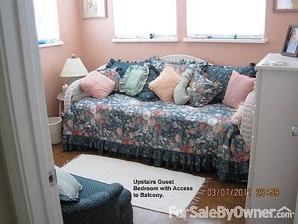 Guest Bedroom on Third Floor
						:
						Third floor Guest Bedroom. Full Bath between BDRS. Both balcony views of Bay.