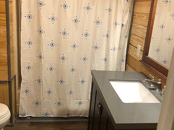 Bathroom with tub and shower