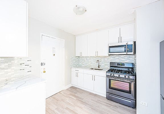 5th image of 66-15 Wetherole St #B2