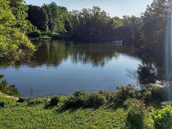 Morning Sun In Back Yard with Fishing Boat