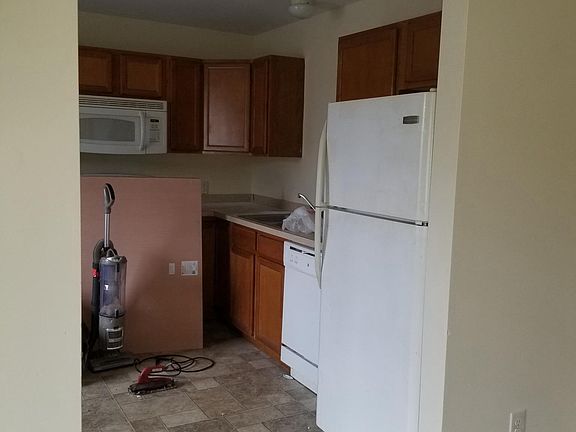 Eat in kitchen, built in microwave, dishwasher. View is from