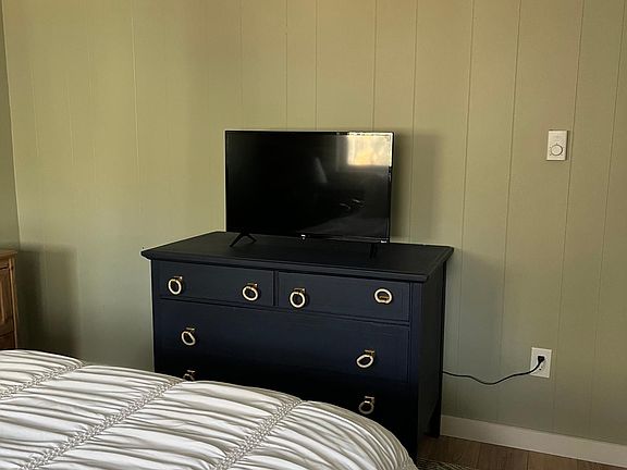 One of three bedrooms