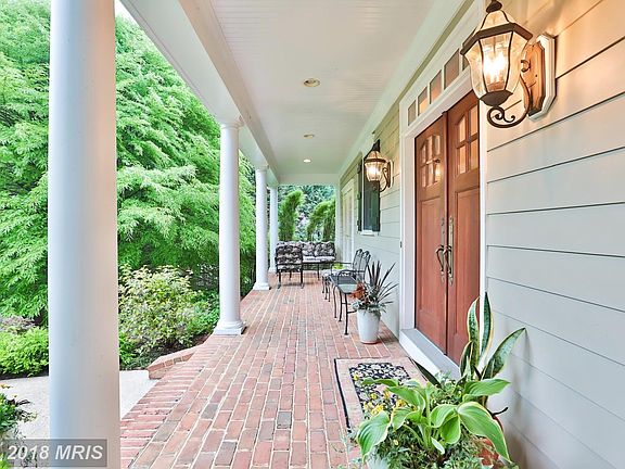 Access porch from main entrance or den