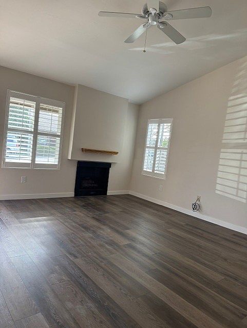 Family room with vaulted ceiling and fireplace