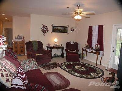 The living room opens to the patio