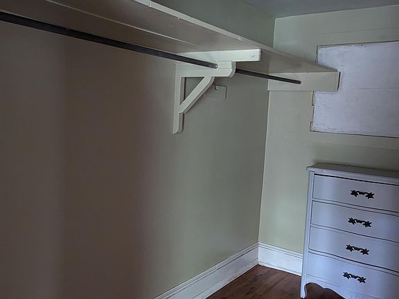 Walk-in closet with chest of drawers
