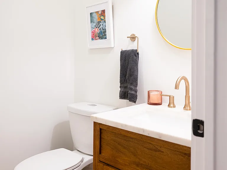 Guest .5 Bathroom in between the Kitchen and Laundry Room