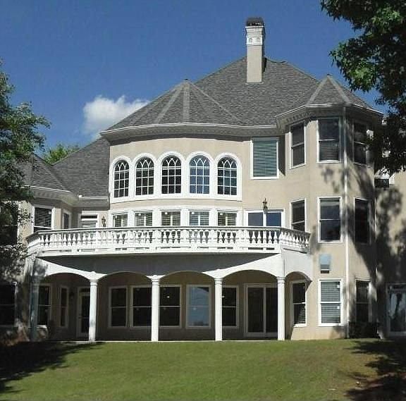 Magnificent Rear Circular Cement Decking and Patio Below