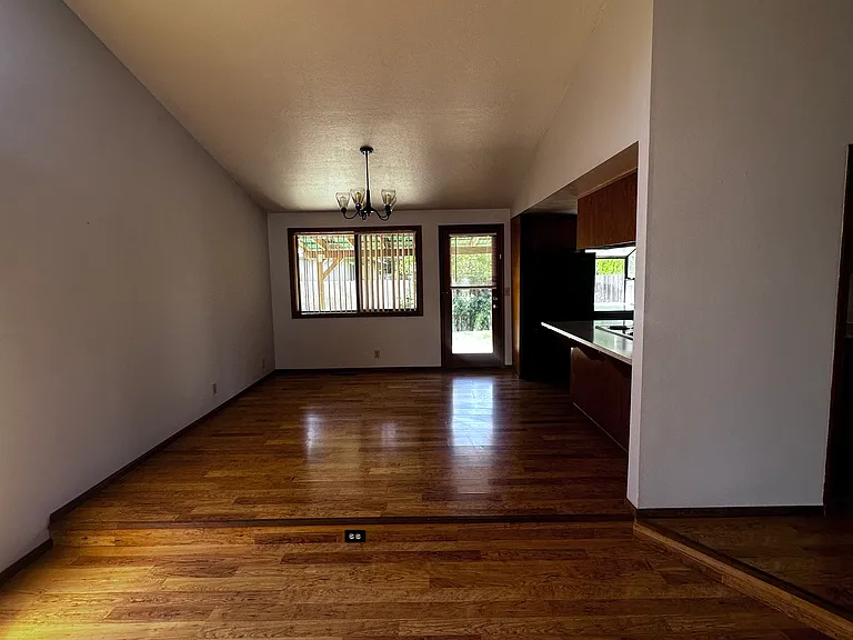 Living space looking towards nook / dining area