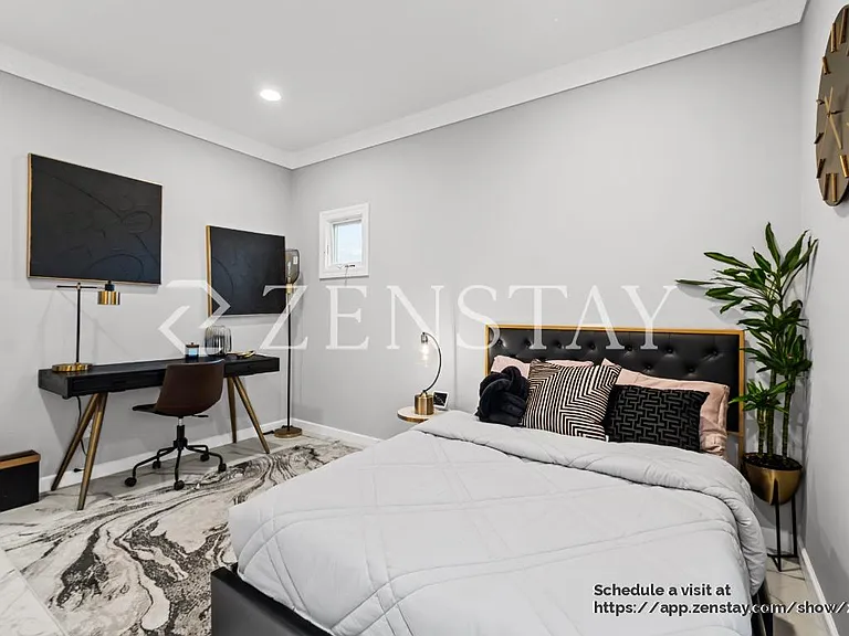 Bedroom with full bed and terrace