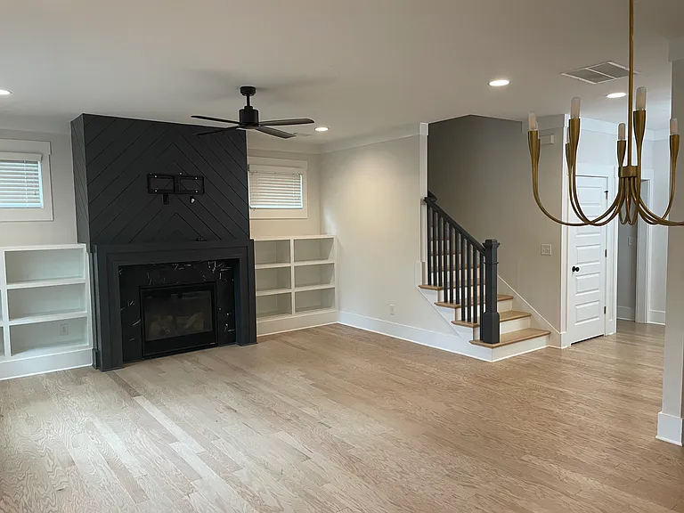 Living area. Electric (on/off switch) fireplace. Large storage closet.