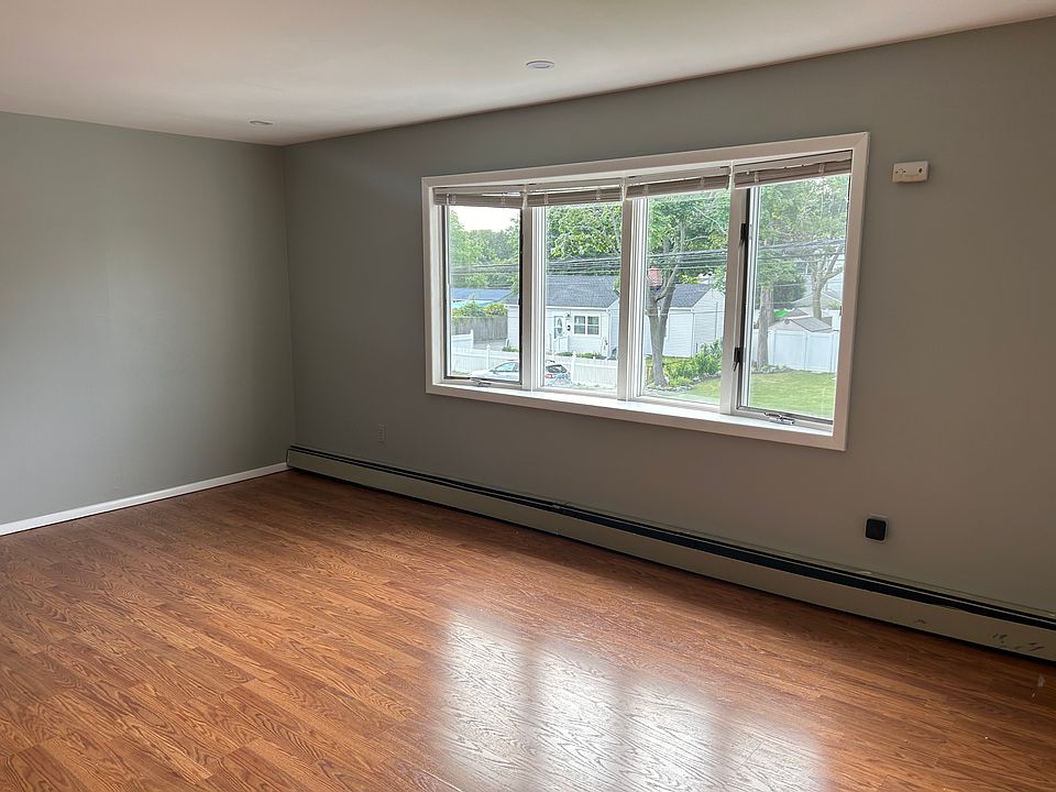 Large Livingroom with over sized picture window.