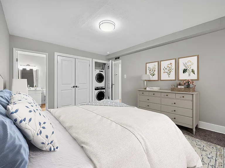 Unwind in a serene bedroom at The Woods at Ambler, an Eagle Rock Community. Enjoy modern amenities and a cozy atmosphere designed for comfort. Schedule your tour today and step into your new sanctuary!