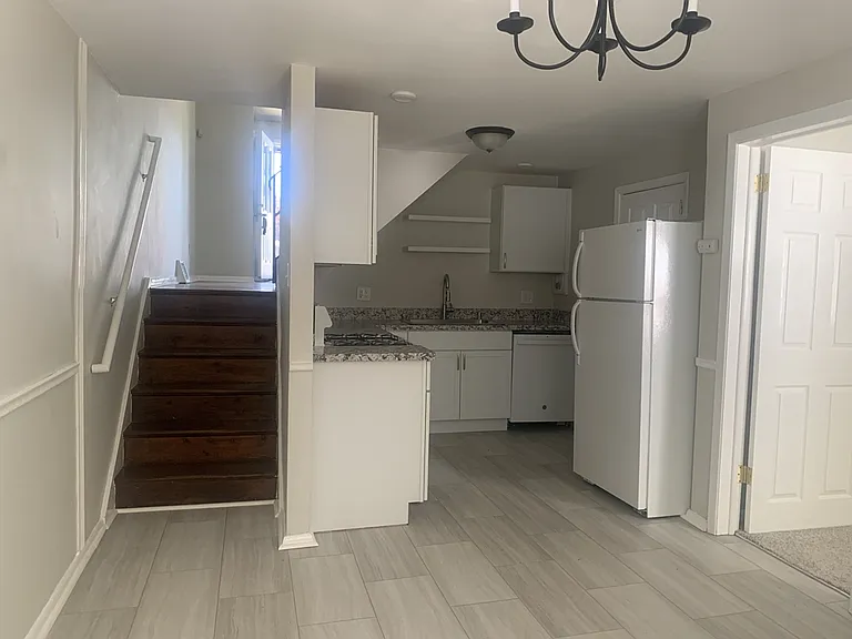 Dining area opens into new kitchen