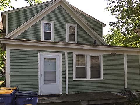 Back deck. Additional off-street parking includes 1 stall in