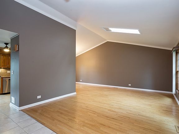 Open foyer, living, dining room and kitchen.
