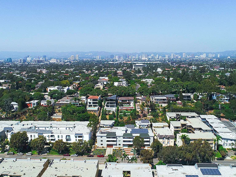 Aerial drone view of Rose North Apartments showing the Palms neighborhood of Los Angeles.