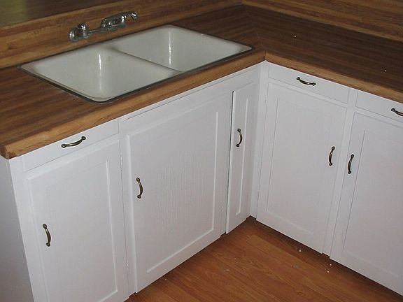 Newly painted and laminate wood kitchen area!