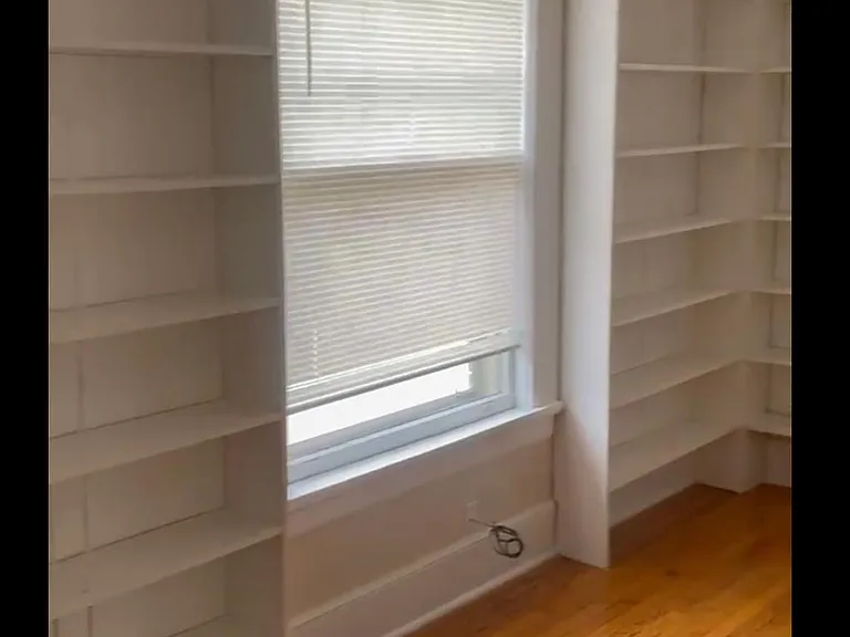 Office view #3 potential 3rd bedroom. More built in book shelves.