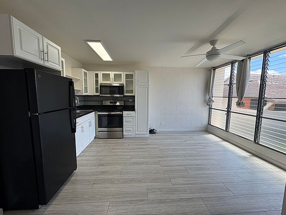 Bright and open kitchen/living room.