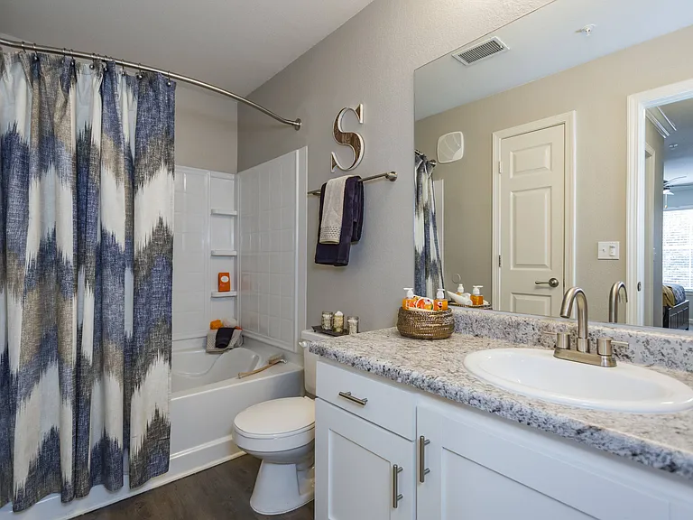 Bathroom with Large Vanity and Tub