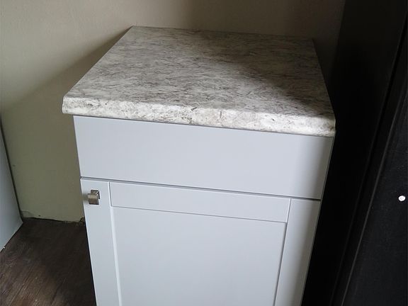 Grey cabinetry and new counter tops to compliment the color scheme!