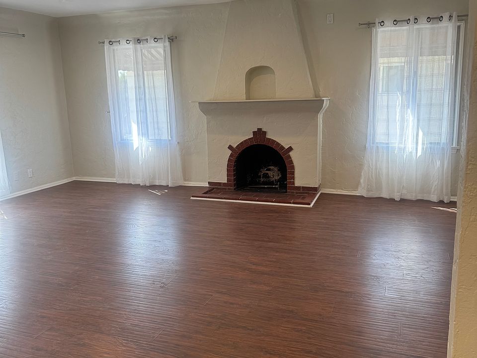 Living room with decorative fireplace