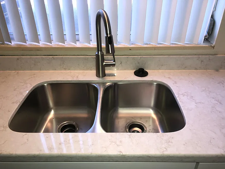 MORNING SUN KITCHEN WITH DEEP WELL 50/50 SS SINK DISPOSAL, UPGRADED FAUCET WITH PULL OUT SPRAYER | BEAUTIFUL QUARTZ COUNTERS SERIOUSLY UPGRADED