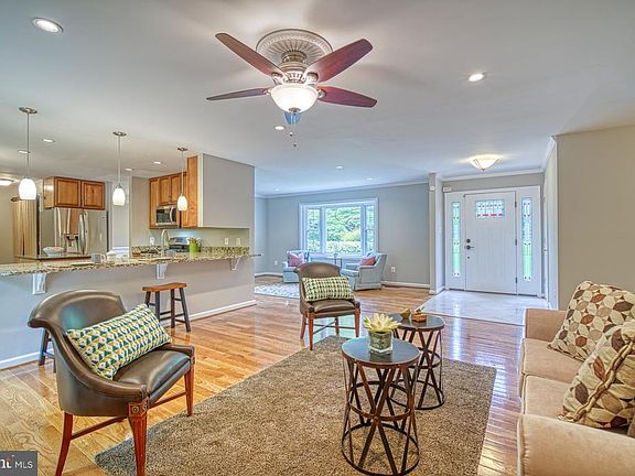 Open floor plan with recessed lighting