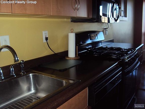2nd image of 2077 Center Ave APT 10H