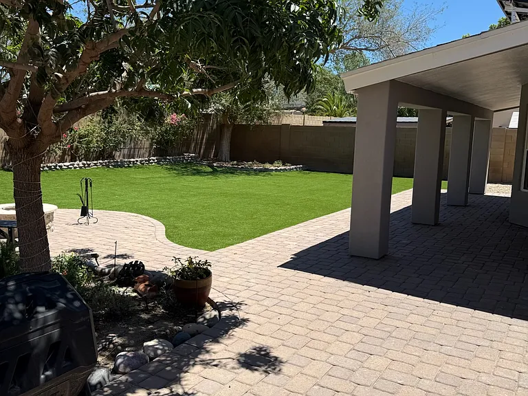 Everything is on 9-station irrigation auto system. 4 large mature trees. 8 different flower, plants and herb planters