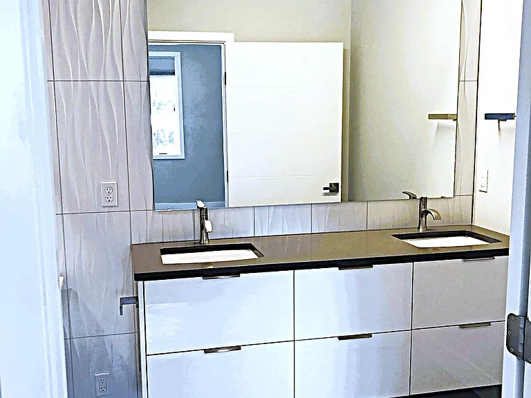 Master bathroom with lots of tiles