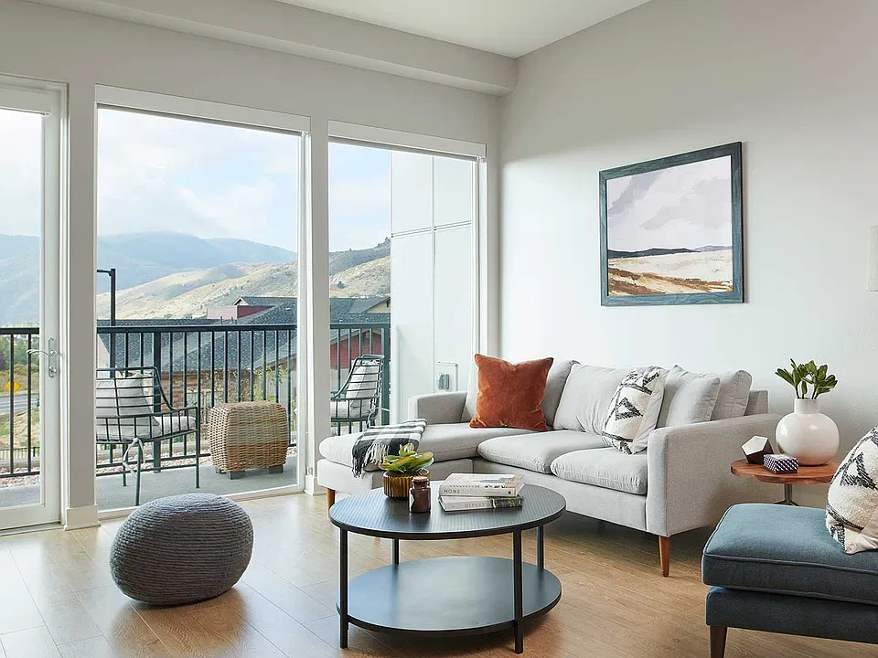 Oversized windows, a private balcony and open, light-filled living space bring Epoque's foothill setting right into the home.