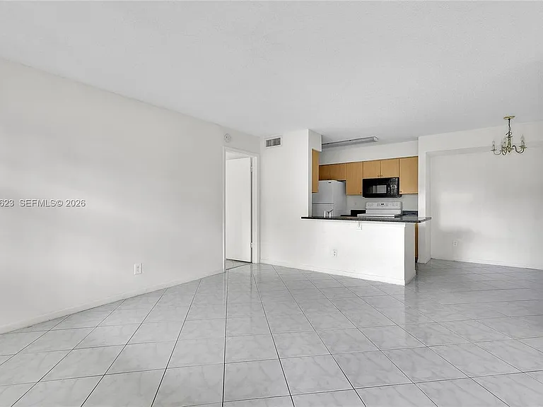 755 NW 104th Ave #104 — Photo 2