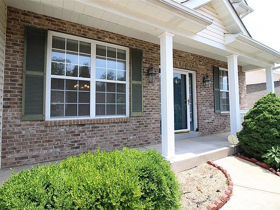 Large porch perfect for a couple chairs and great conversations.