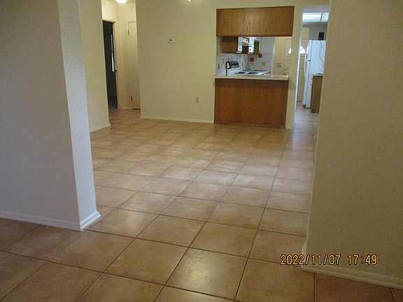 living room and small bonus room combo