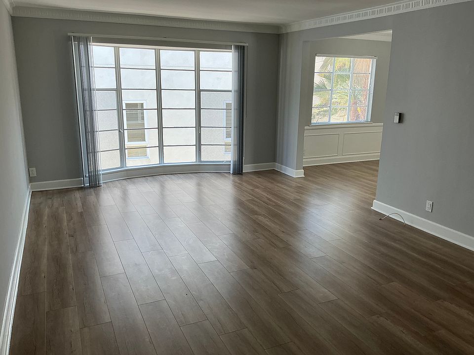 Recently upgraded retro/modern apartment home with spacious living and dinning area. View from the front door.