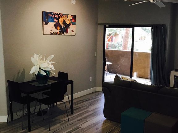 Living, dining, patio - couch included in rental