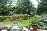 Home backs to open space; beyond fence is perfect for garden