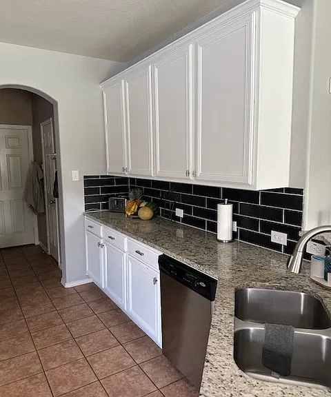 Newly updated kitchen with stainless steel appliances.