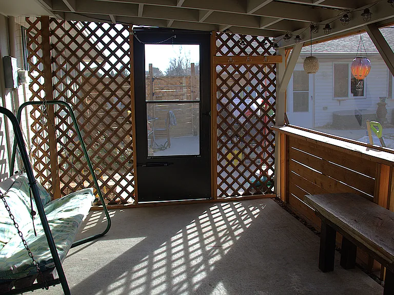 Covered screen porch (swing and bench not included)