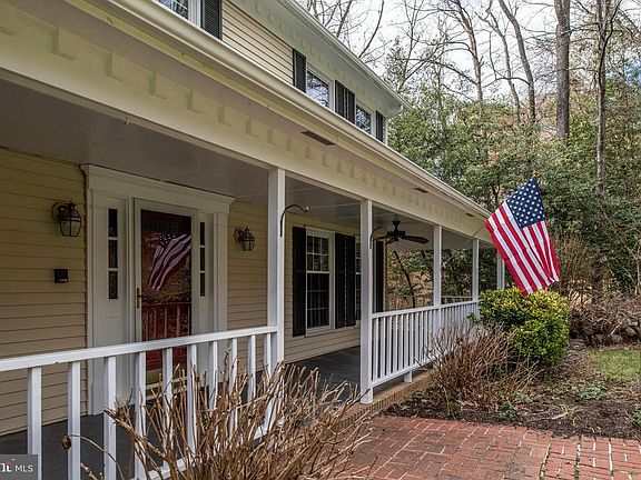 View of front door and brick walkway