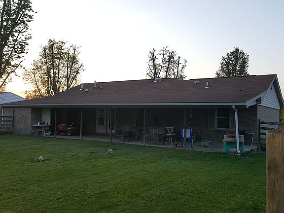 Covered porch and storage sh