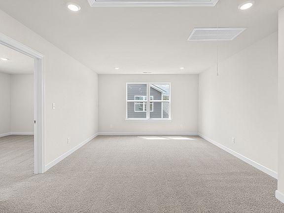 Rest and relaxation await in the master bedroom