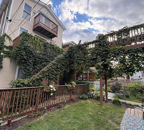 view of yard catwalk and ivy